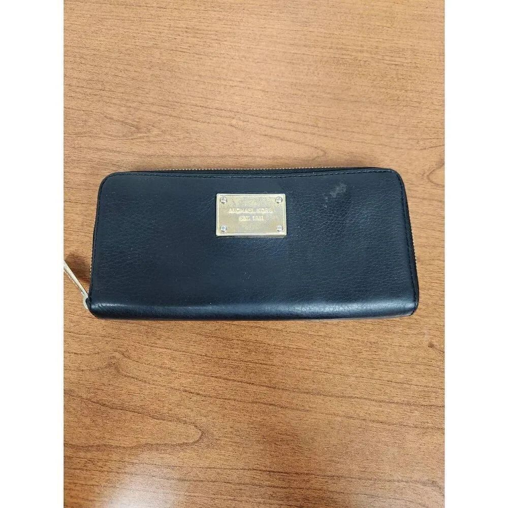 Michael Kors BLACK full zip long wallet.  Scratches on hardware and slight rub s